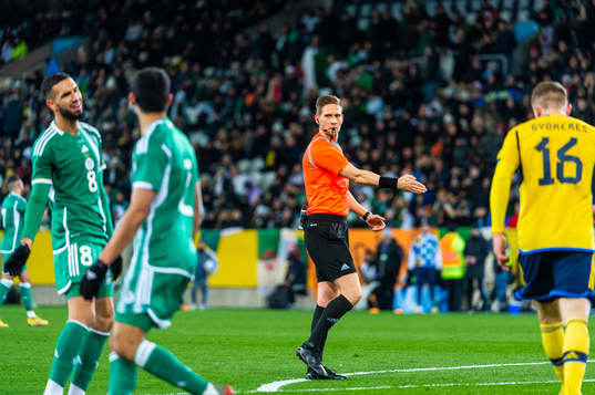 Referee Espen Eskås calls a penalty shot for of Sweden