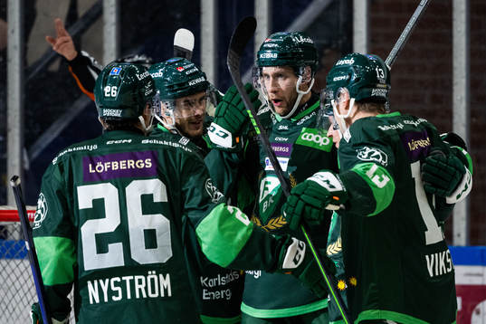 Färjestads Per Åslund jublar med lagkamrater