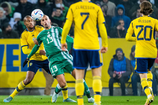 Isak Hien of Sweden and Islam Slimani of Algeria