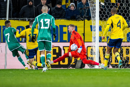Riyad Mahrez of Algeria with a shot against goalkeeper