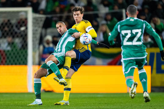 Islam Slimani of Algeria and Victor Nilsson Lindelöf of