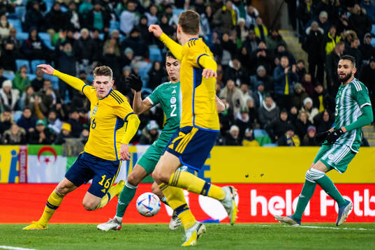 Viktor Gyökeres and Viktor Claesson of Sweden attack