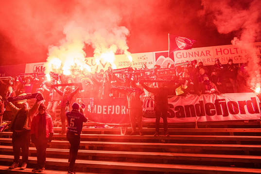 Spectators in the stands celebrates
