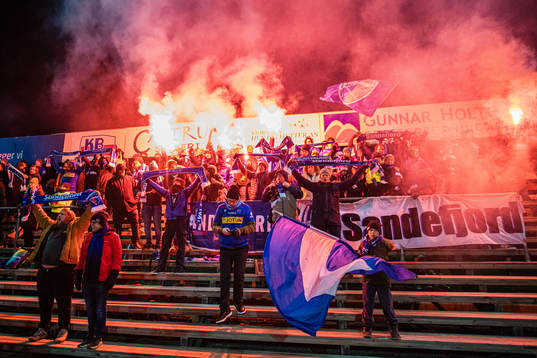 Spectators in the stands celebrates