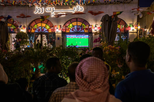 People watch the FIFA World Cup 2022 football match between