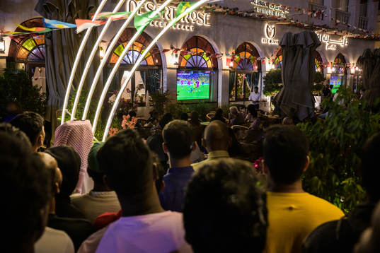 People watch the FIFA World Cup 2022 football match between