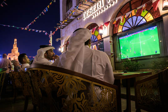 People watch the FIFA World Cup 2022 football match between