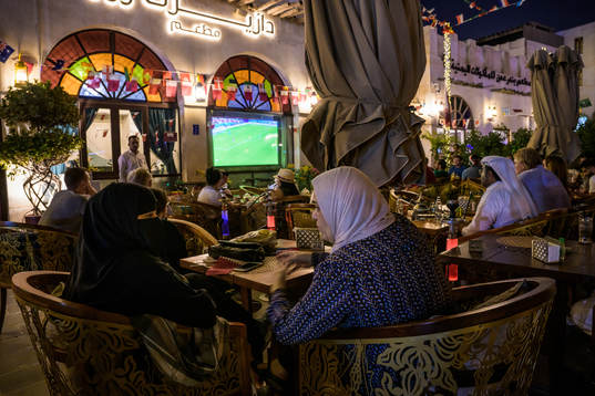 People watch the FIFA World Cup 2022 football match between