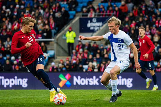 Martin Ødegaard of Norway and Ilmari Niskanen of Finland