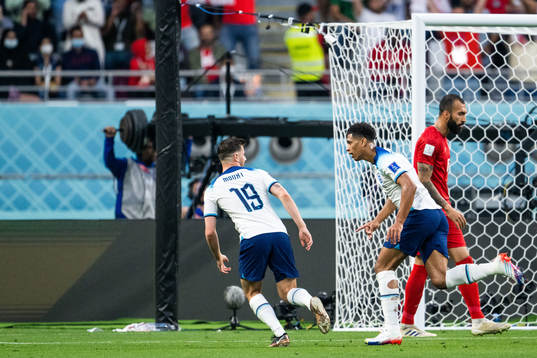 Mason Mount and Jude Bellingham of England celebrate 1-0