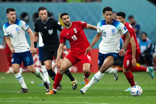 Mason Mount and Jude Bellingham of England and Ali Karimi