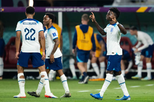 Bukayo Saka of England celebrates scoring 4-0