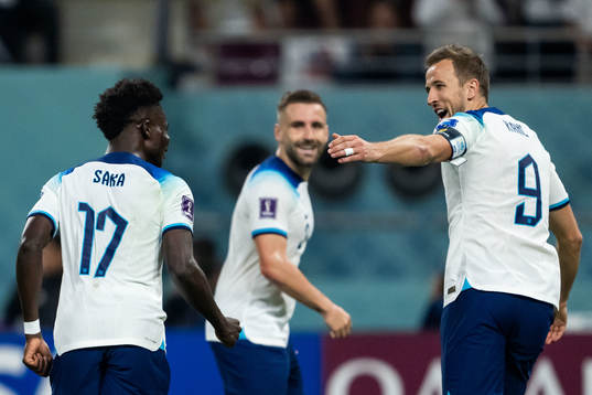 Bukayo Saka and Harry Kane of England celebrate 4-0