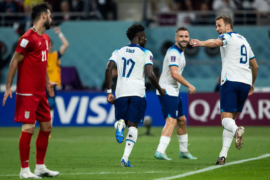 Bukayo Saka and Harry Kane of England celebrate 4-0