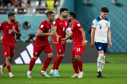 Mehdi Taremi of Iran celebrates scoring 4-1