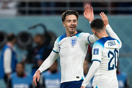 Jack Grealish and Phil Foden of England celebrate 6-1