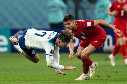 Jack Grealish of England and Morteza Pouraliganji of Iran