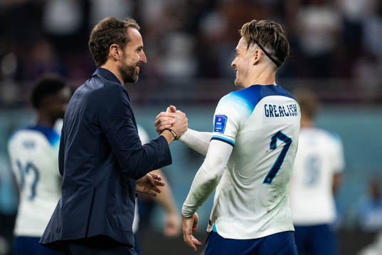 Head coach Gareth Southgate and Jack Grealish of England