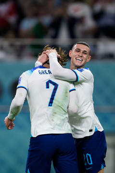 Jack Grealish and Phil Foden of England celebrate the 6-1