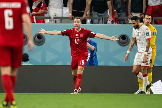 Christian Eriksen of Denmark reacts
