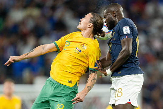 Jackson Irvine of Australia and Dayot Upamecano of France