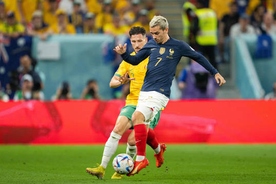 Mathew Leckie of Australia and Antoine Griezmann of France