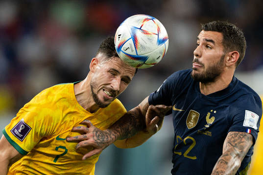 Mathew Leckie of Australia and Theo Hernandez of France