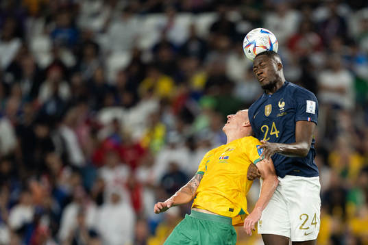 Mitchell Duke of Australia and Ibrahima Konate of France