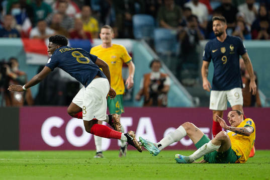 Aurelien Tchouameni of France and Jackson Irvine of