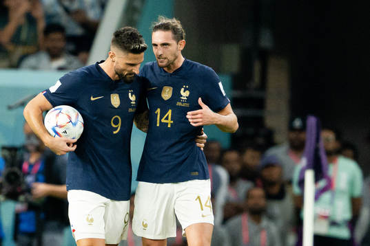 Olivier Giroud and Adrien Rabiot of France celebrate the