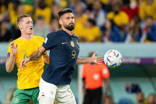 Kye Rowles of Australia and Olivier Giroud of France