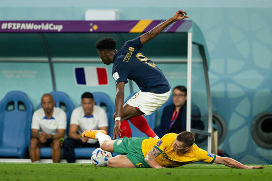 Aurelien Tchouameni of France and Mitchell Duke of Australia