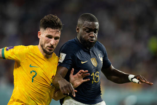 Mathew Leckie of Australia and Dayot Upamecano of France