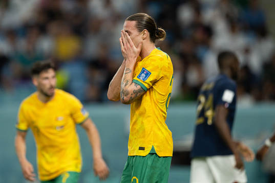 Jackson Irvine of Australia looks dejected