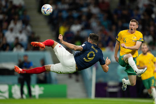 Olivier Giroud of France and Kye Rowles of Australia