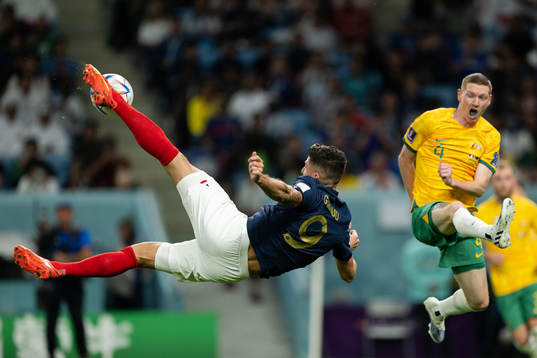 Olivier Giroud of France and Kye Rowles of Australia