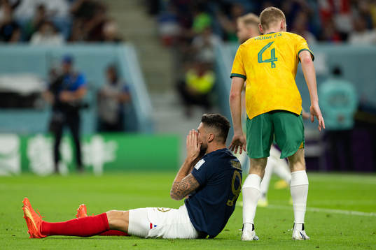 Olivier Giroud of France and Kye Rowles of Australia