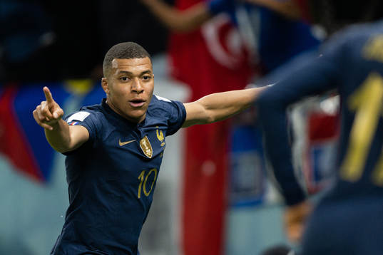 Kylian Mbappe of France celebrates the 3-1 goal