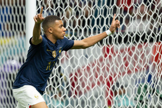 Kylian Mbappe of France celebrates the 3-1 goal
