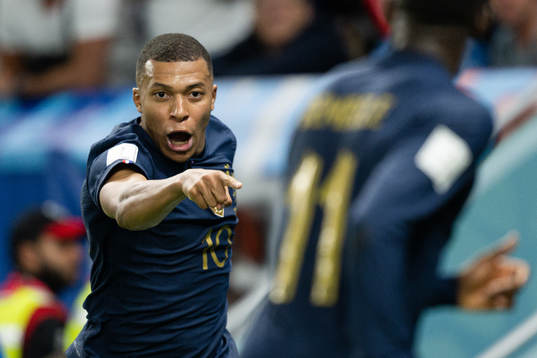 Kylian Mbappe of France celebrates the 3-1 goal