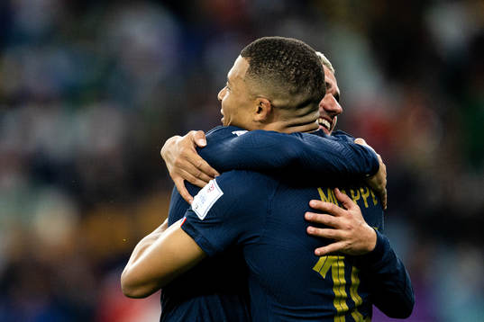 Antoine Griezmann and Kylian Mbappe of France celebrate the