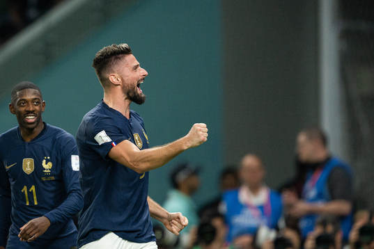 Ousmane Dembele and Olivier Giroud of France celebrate the