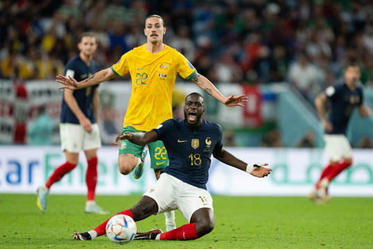 Jackson Irvine of Australia and Dayot Upamecano of France