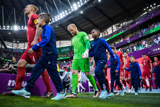 Simon Kjær and goalkeeper Kasper Schmeichel of Denmark