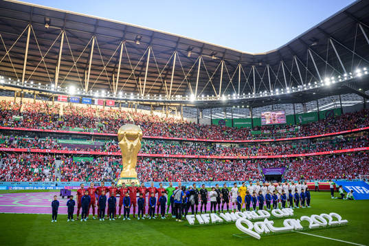 Players of Denmark and Tunisia at line-up