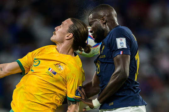Jackson Irvine of Australia and Dayot Upamecano of France