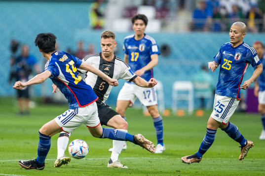 Daichi Kamada and Daizen Maeda of Japan and Kai Havertz of
