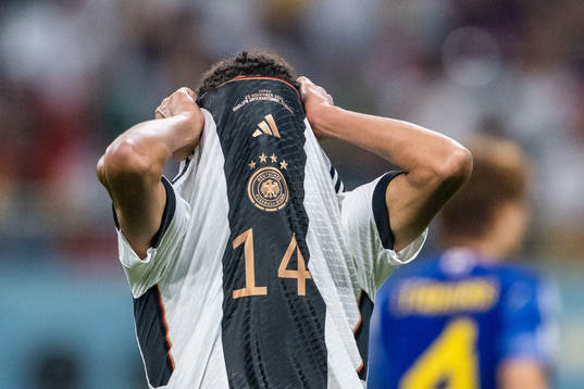 Jamal Musiala of Germany looks dejected