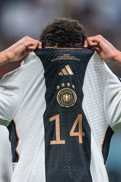 Jamal Musiala of Germany looks dejected