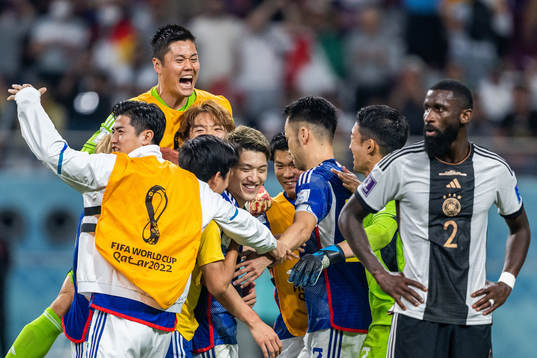 Antonio Rüdiger of Germany looks dejected while Ritsu Doan
